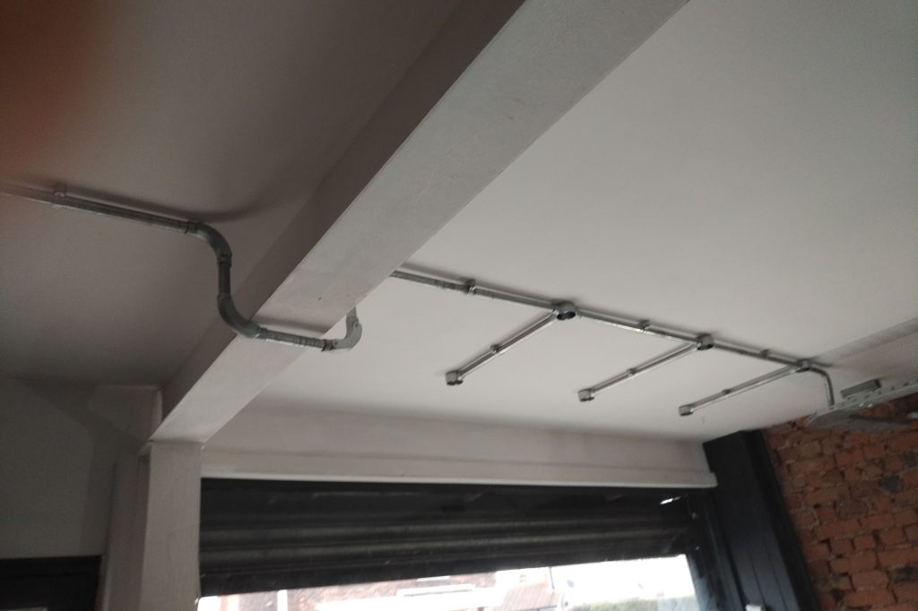 the inside of a commercial shop premises showing the ceiling