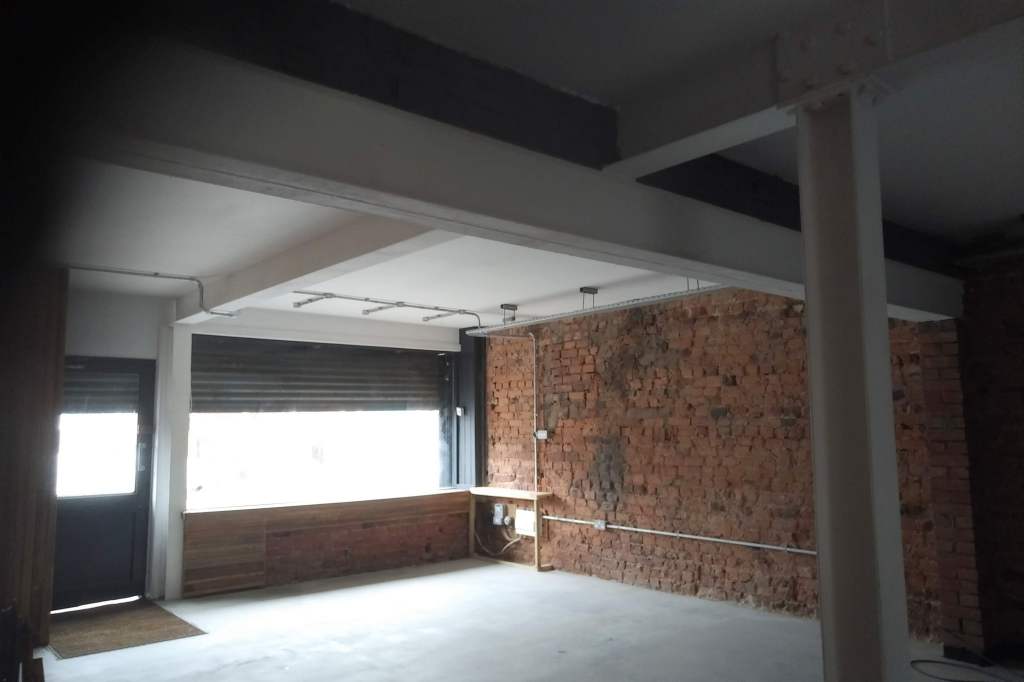 the interior of a newly renovated commercial work space