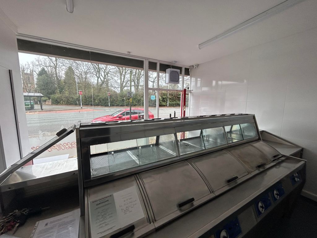 the interior of a fish and chip shop for rent